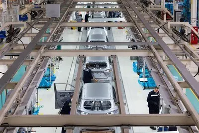 Photo of automobile production line Modern car assembly plant Modern and hightech automotive industry