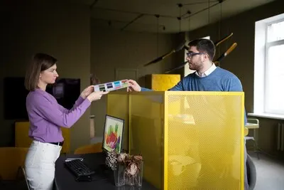 Medium shot people holding color palette