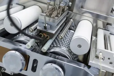 Metal chromed manufacture machines with shafts wires and electronics close turned