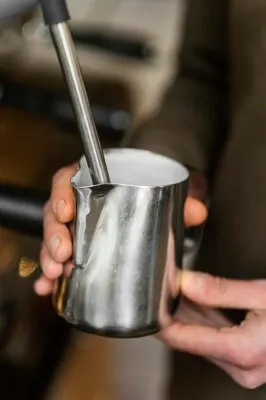 Close up  hands holding coffee cup