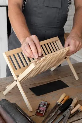 Person working on wood object