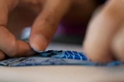 Woman making origami with japanese paper