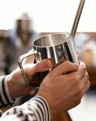 Close up hands holding cup