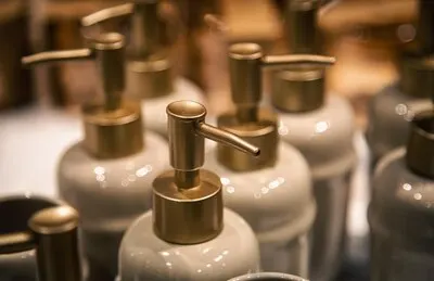 Closeup bottles with dispensers for liquid soap