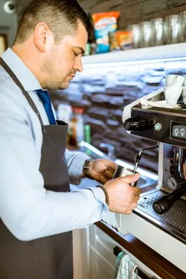 Barman making coffee